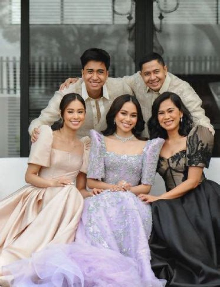 Bella Racelis with her family