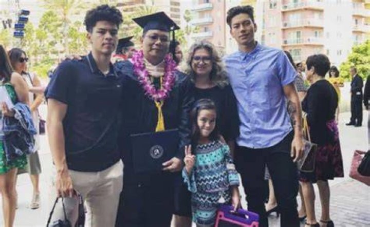 Dwight Ramos with his father, mother, brother and sister