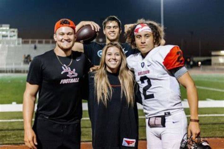 Jalen Kitna with his dad and mom
