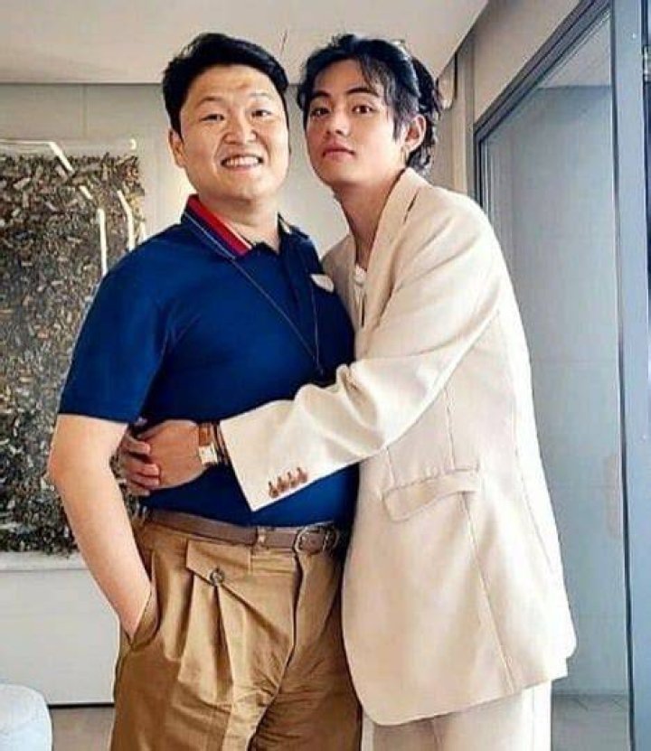 Kim Taehyung with his father and mother