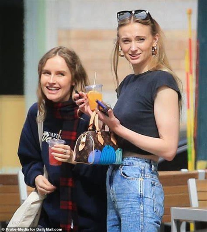 Olivia DeJonge with her mother father and brother